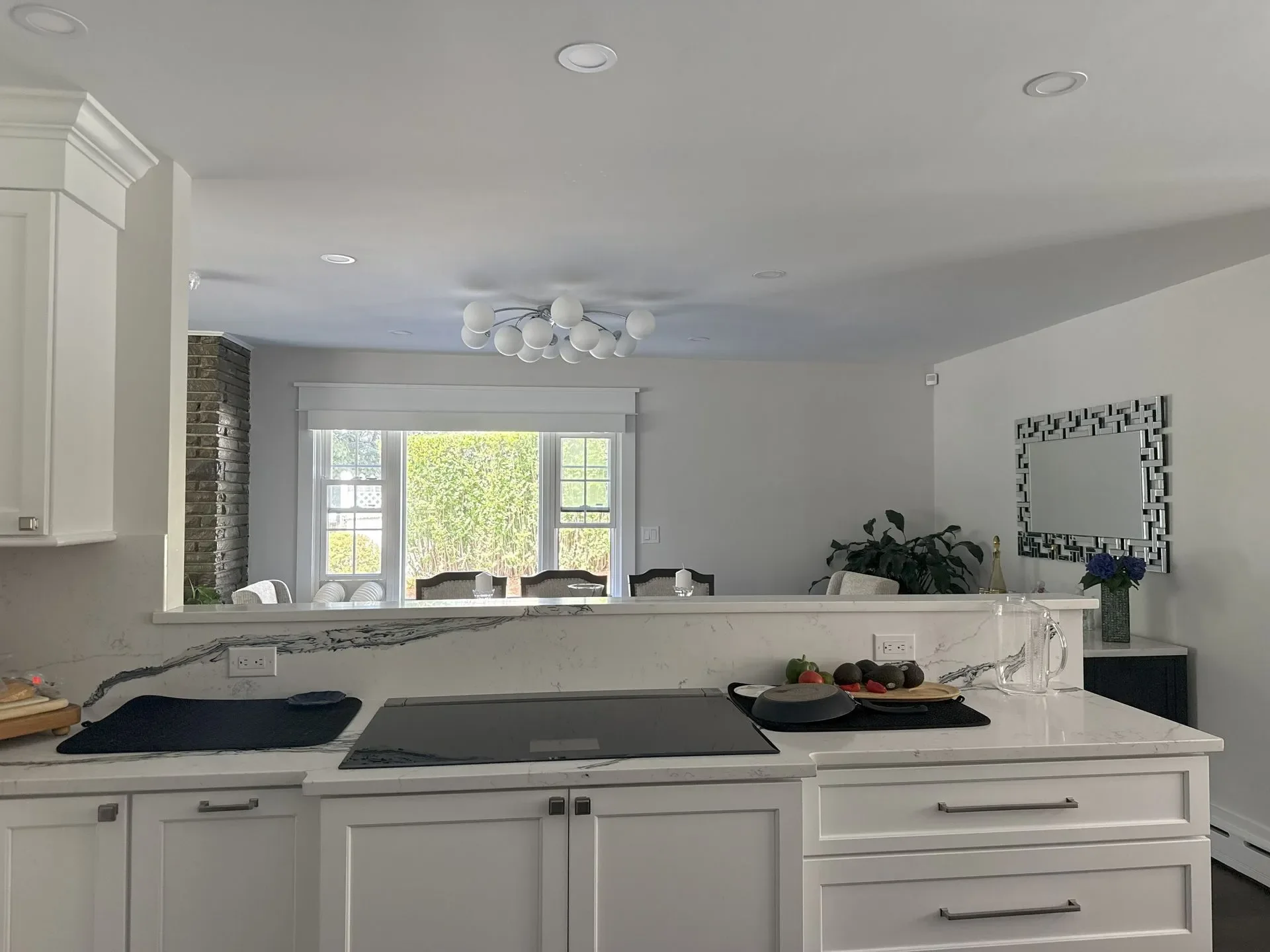Revere Marble-Veined Modern Kitchen — view 9